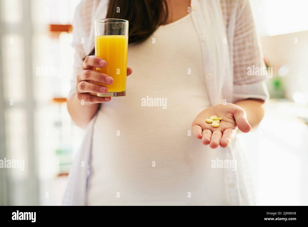 All these vitamins will help the growth for my baby. a pregnant woman