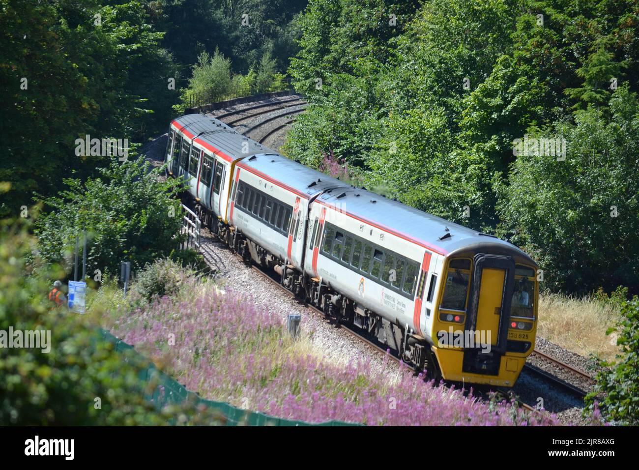 The British Rail Class 158 heading to Bangor from Holyhead, Wales Stock Photo