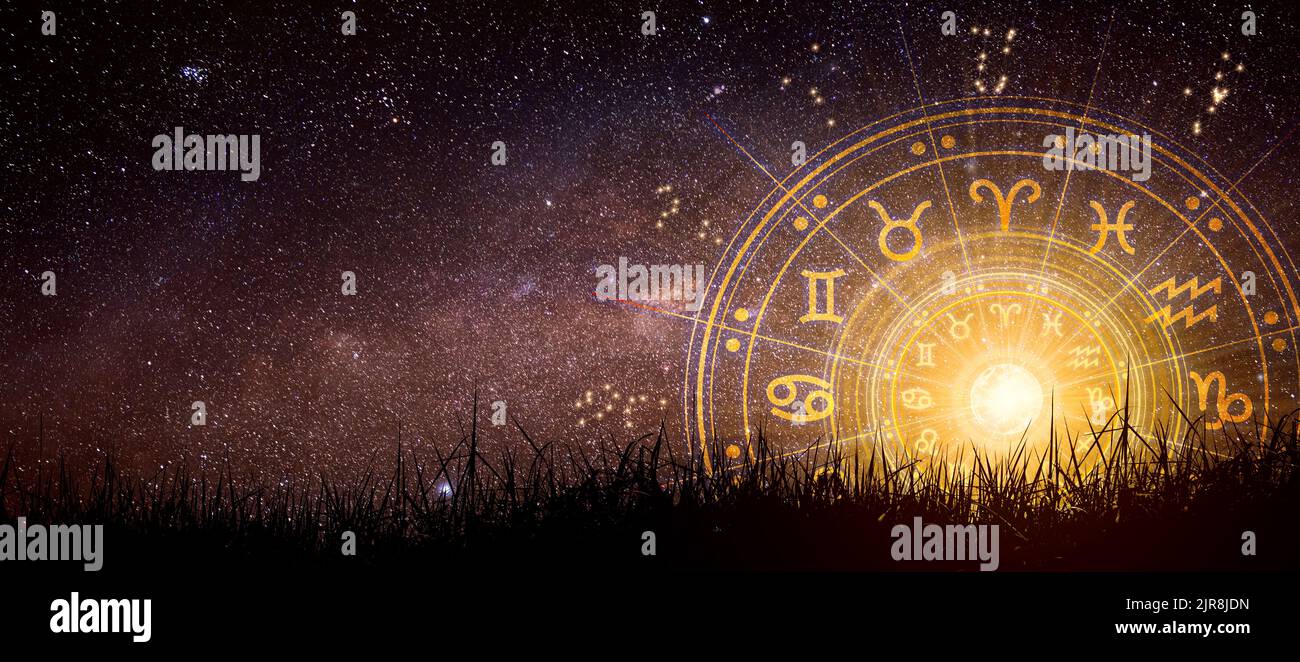 Astrological zodiac signs inside of horoscope circle. Astrology, knowledge of stars in the sky over the milky way and moon. Stock Photo
