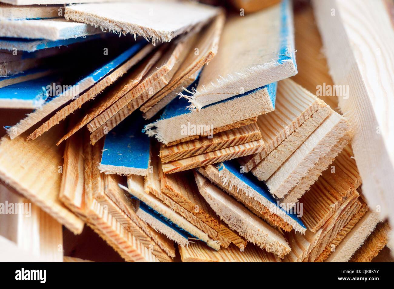 A pile of wood chips and wood waste for recycling. View from above