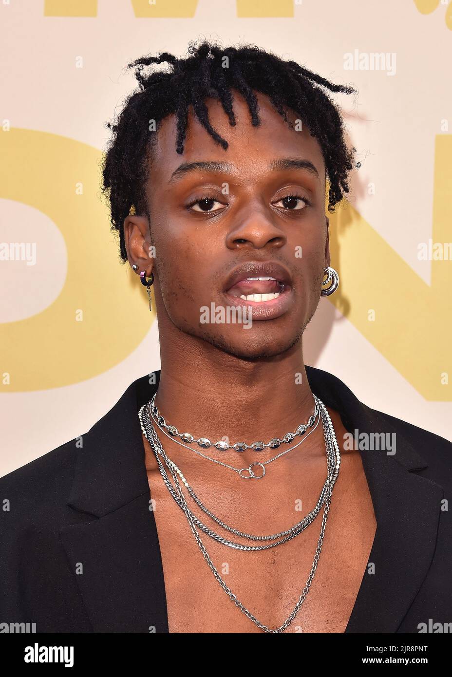 Austin Crute walking the red carpet at the premiere of "Honk For Jesus