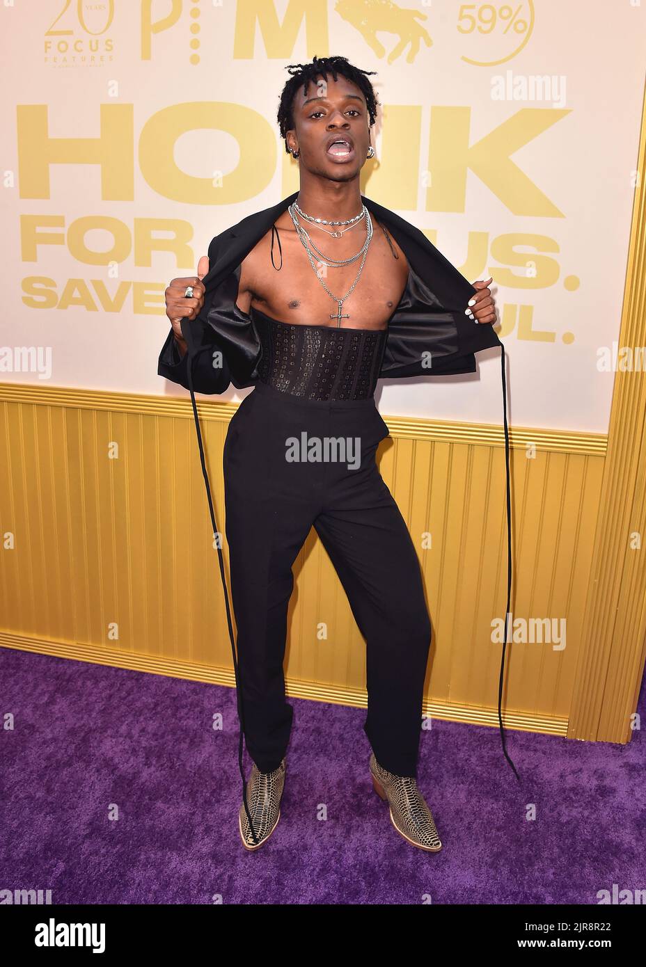 Austin Crute walking the red carpet at the premiere of “Honk For Jesus