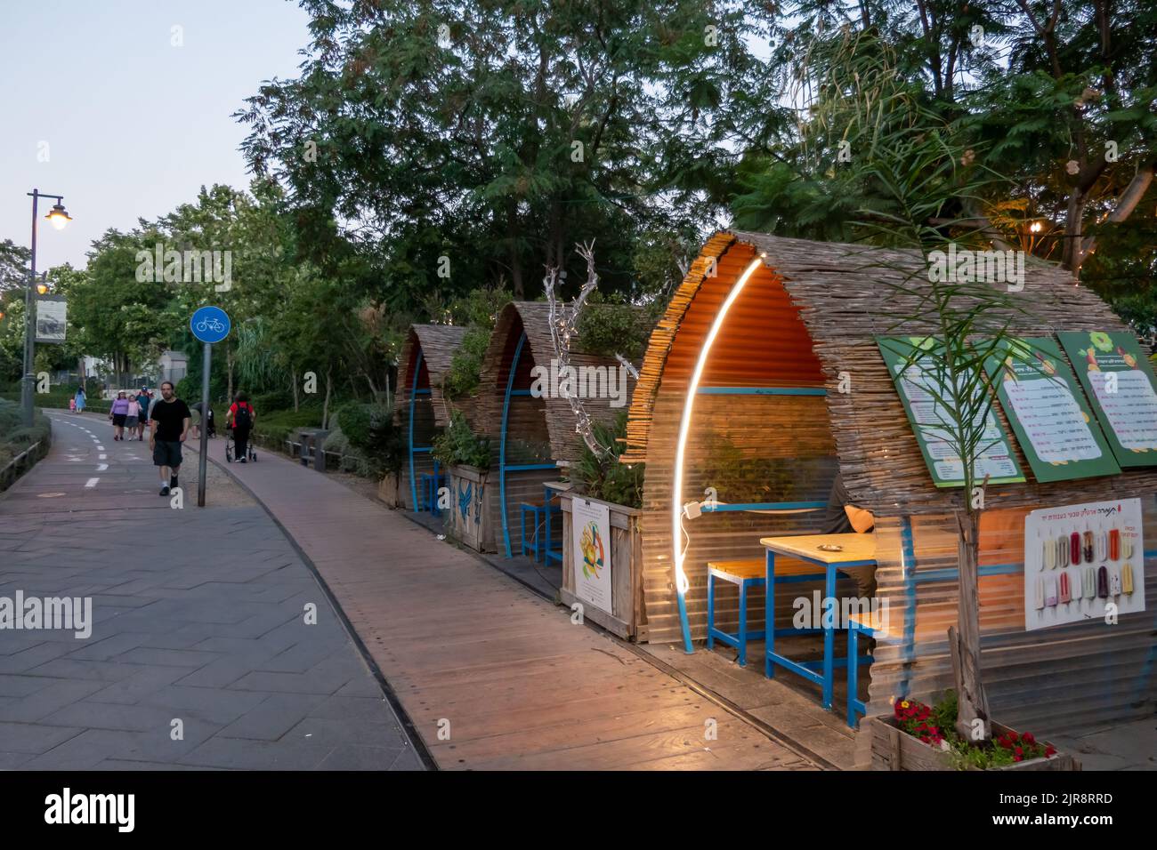 People stroll at the Train Track Park or in Hebrew Park HaMesila which follows the route of the original Jaffa–Jerusalem railway from the Jerusalem Railway Station near the German Colony in west Jerusalem Israel Stock Photo