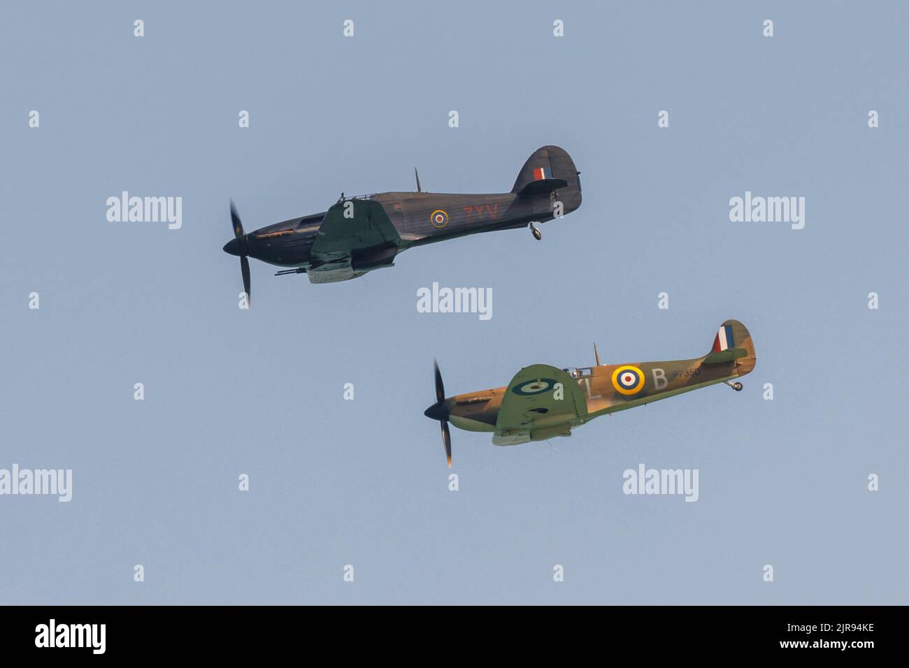 Spitfire and Hurricane in flight Stock Photo