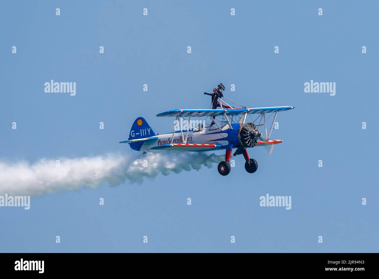 AeroSuperBatics Wingwalkers perform during an airshow in Eastbourne, Susssex, UK Stock Photo