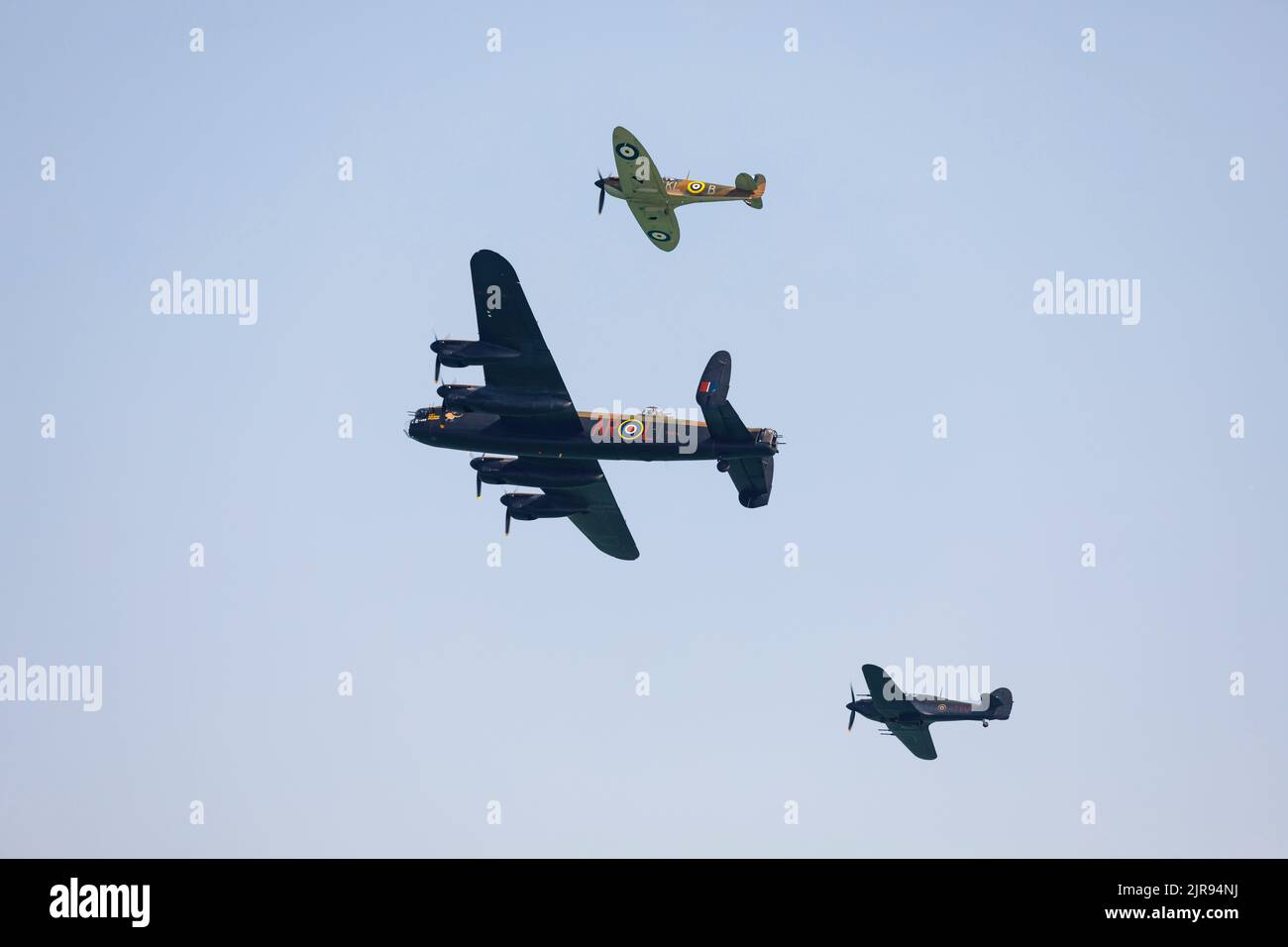 Battle of Britain Memorial Flight.  Lancaster, Spitfire and Hurricane aircraft flying over Sussex, UK Stock Photo