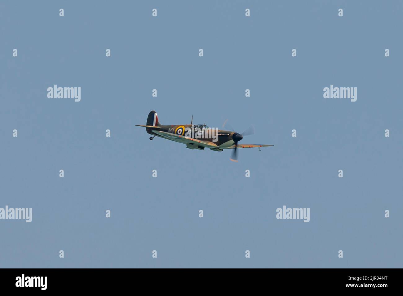 Spitfire in flight Stock Photo