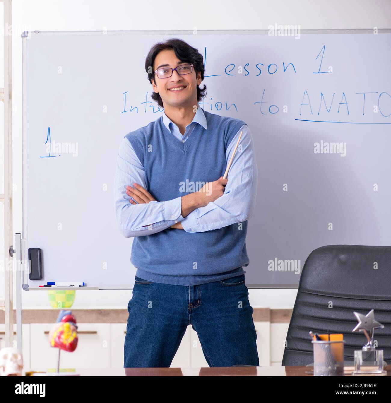 Young lecturer teacher teaching anatomy Stock Photo Alamy