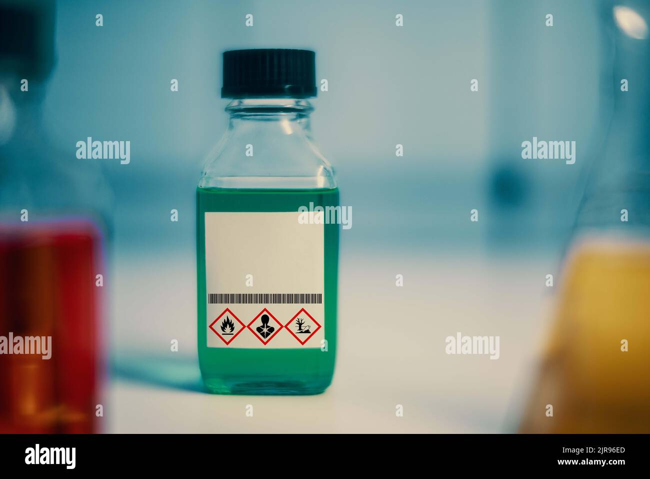 chemical solution glass bottles warning with hazard signs Stock Photo ...