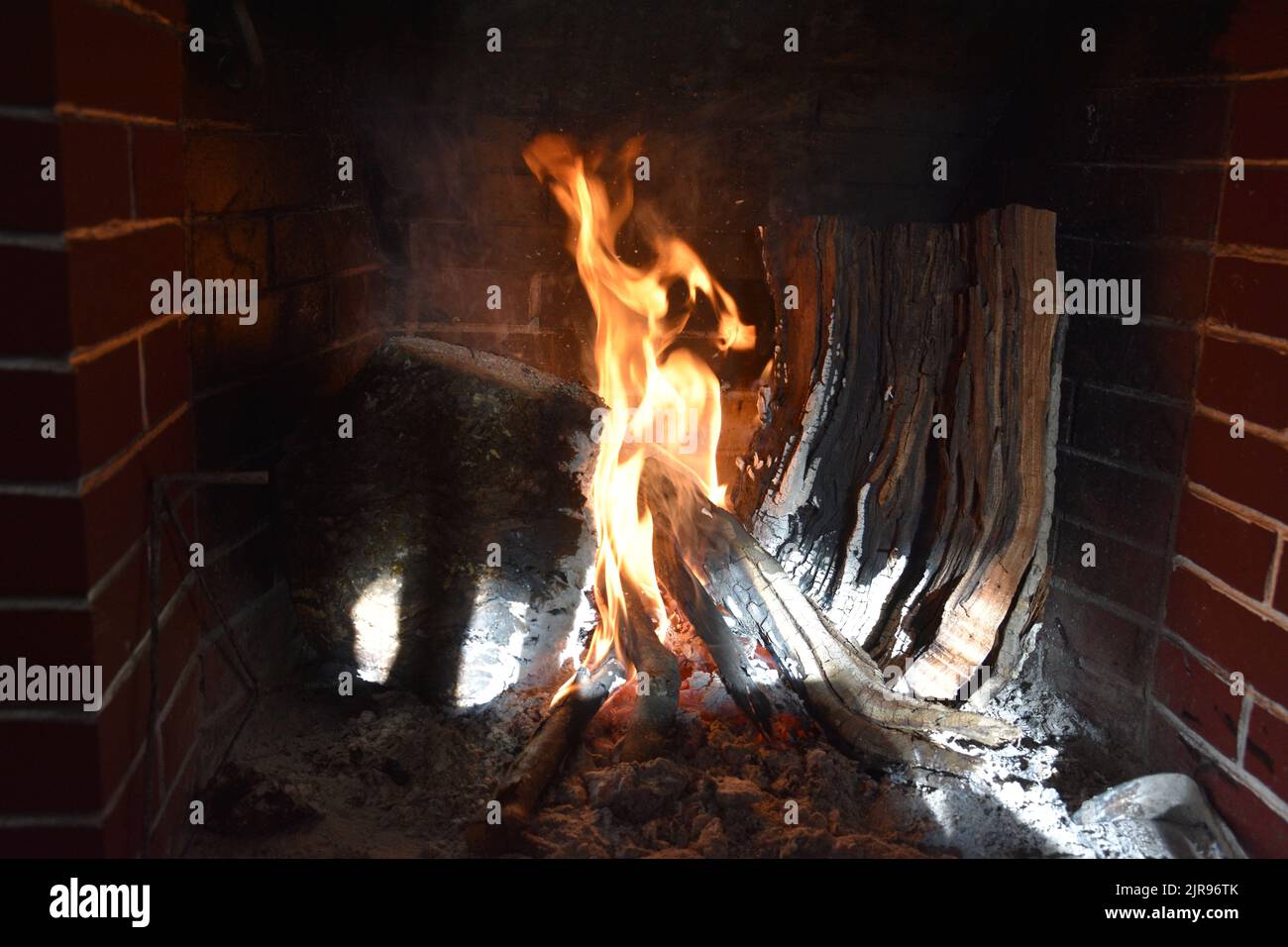 Cosy Fireplace in the VIllage at Winter Stock Photo
