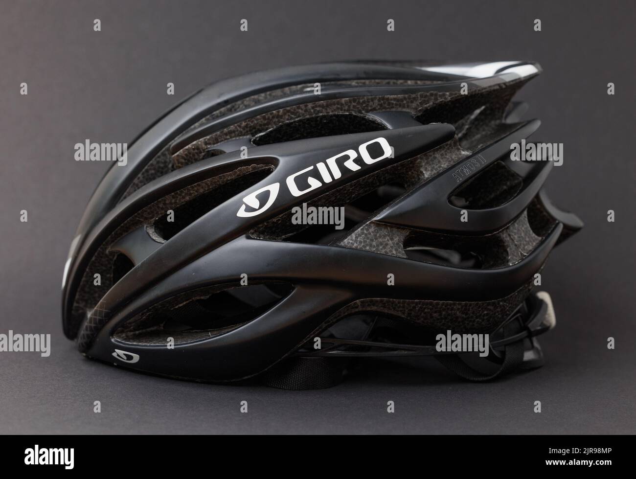 The giro cycling helmet with ventilation holes on a black background
