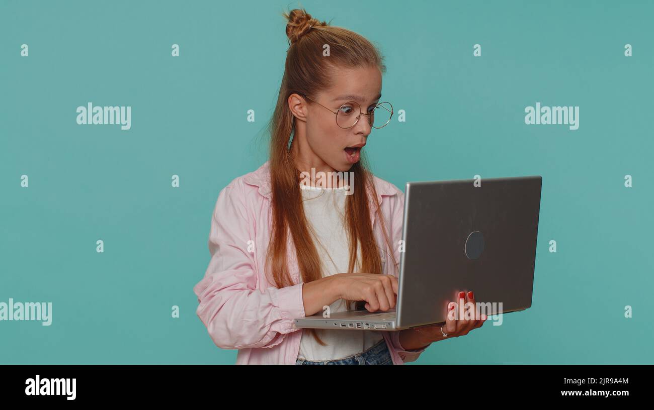 Girl working online on laptop, finishing work, showing thumb up to ...