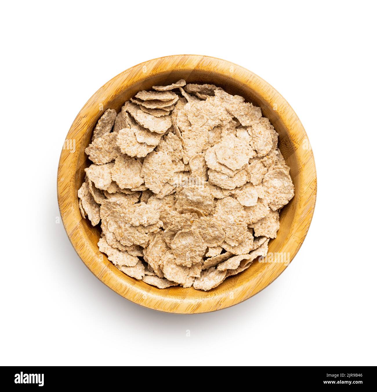 Whole grain cereal flakes in bowl. Wholegrain breakfast cereals