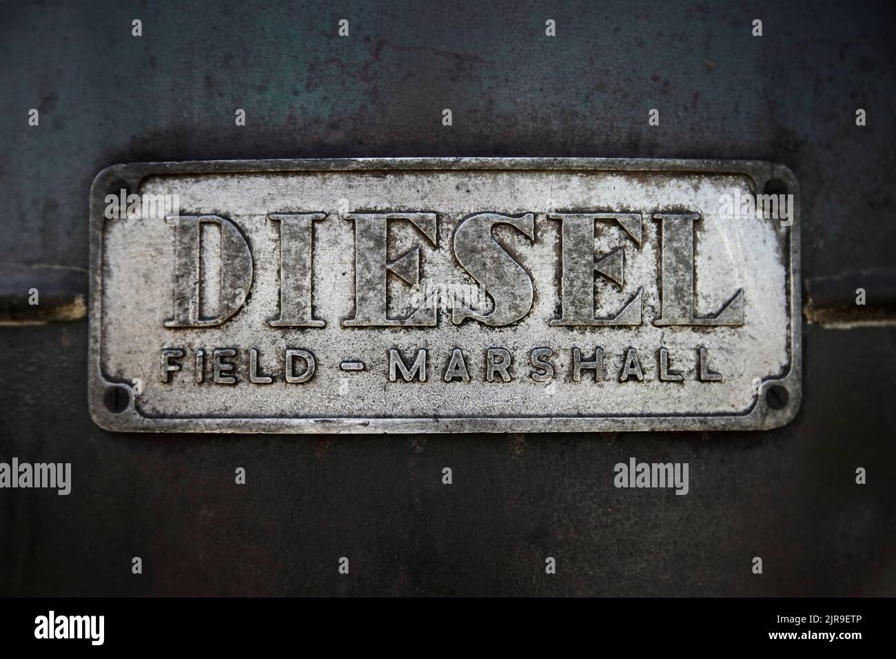 Diesel engine plate on side of vintage Field Marshall tractor, made in Gainsborough, UK until 1957. Stock Photo