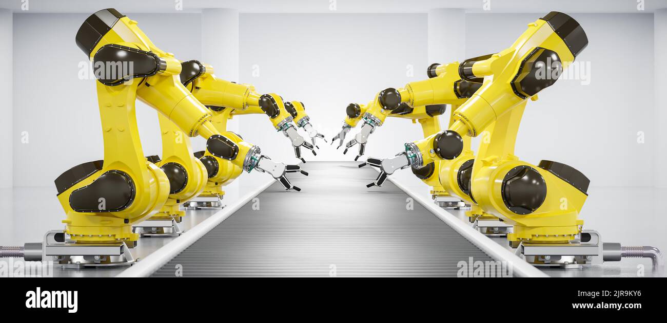 Robots at a conveyor belt Stock Photo Alamy