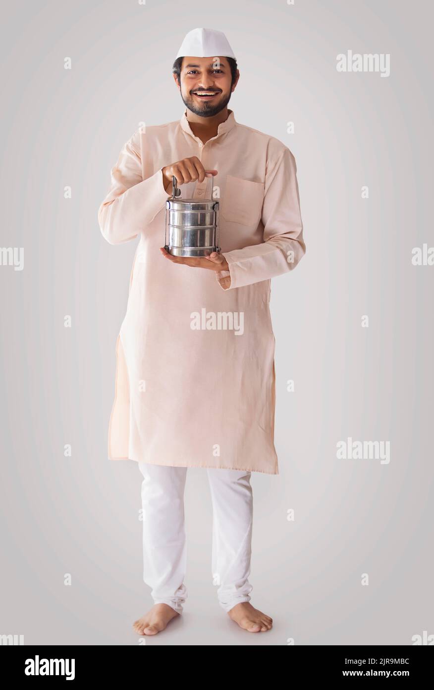 Portrait of a Maharashtrian man with lunch box Stock Photo