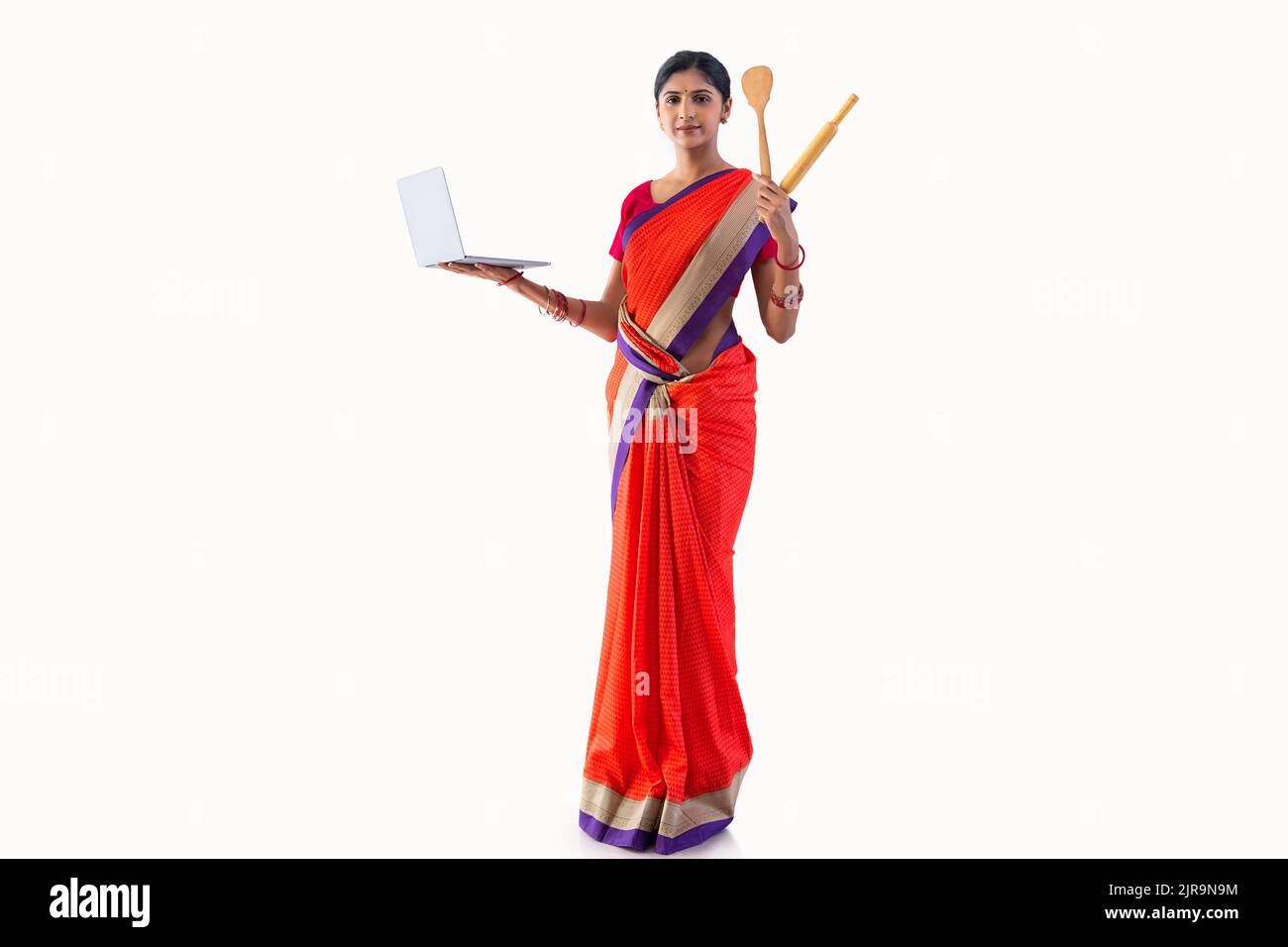 Portrait of multi-tasking woman Stock Photo