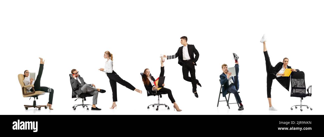 Destroy gender stereotypes. Young office workers in business suits in action isolated on white background. Business, rights, addiction concept. Stock Photo