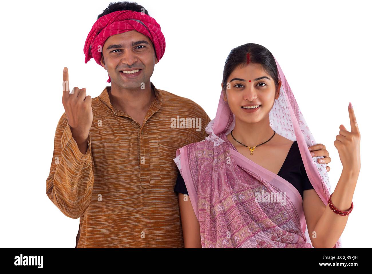 Portrait of Bihar couple pointing above against white background Stock Photo