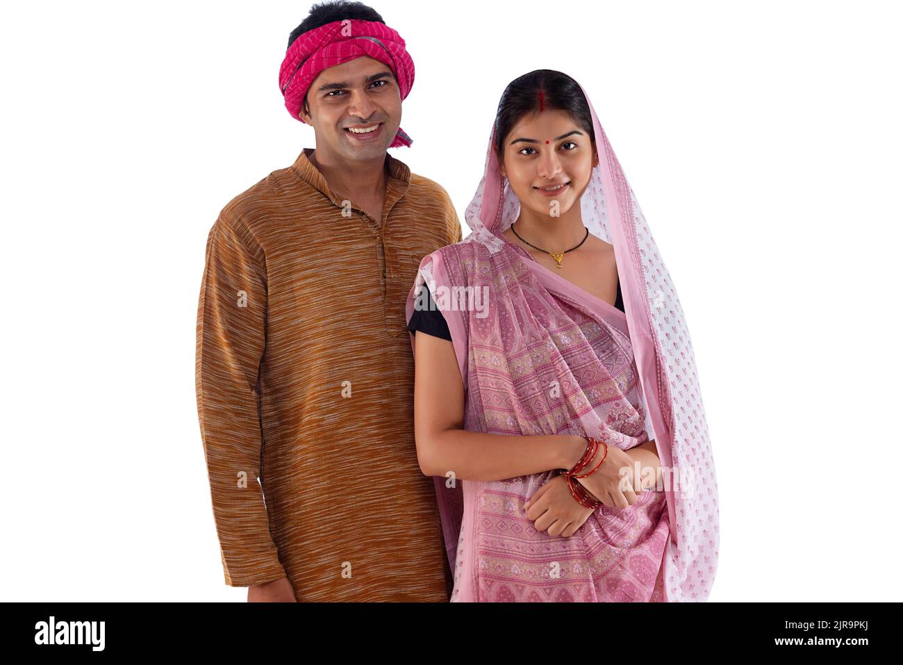 Portrait of happy Bihar couple against white background Stock Photo