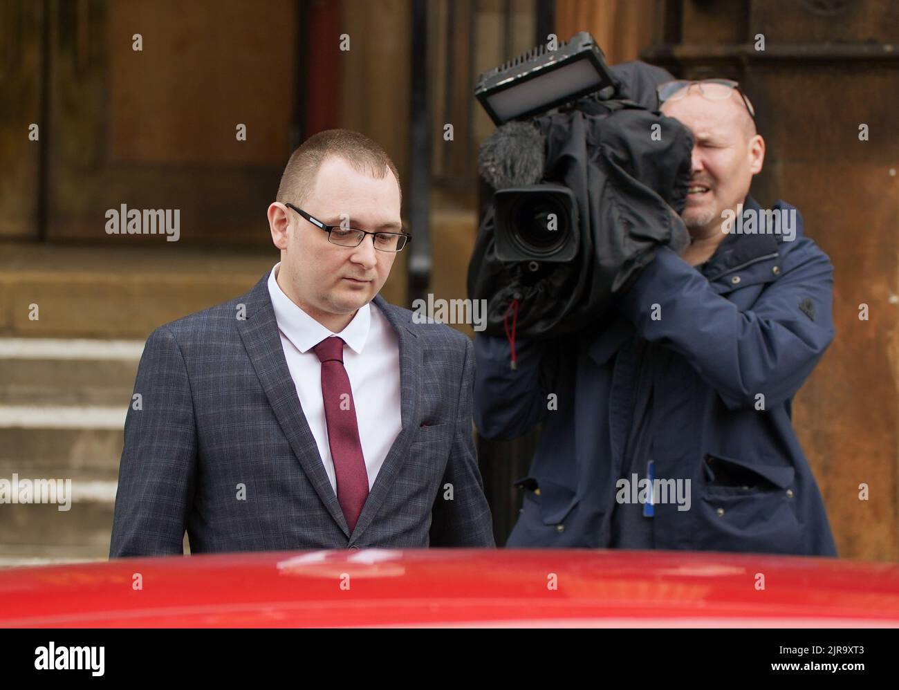 Witness Christopher O'Malley leaving Paisley Sheriff Court after giving