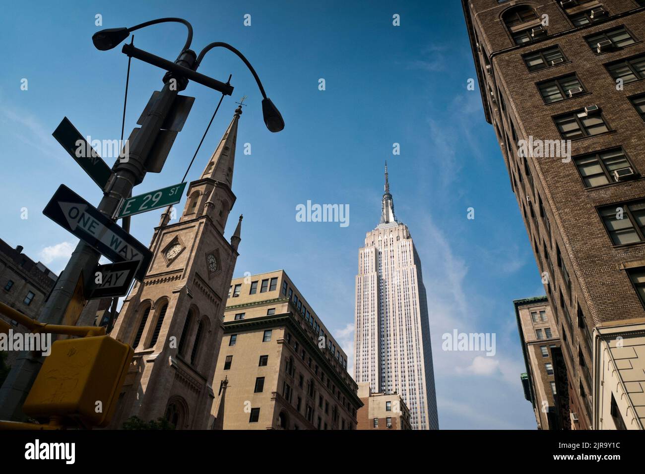 The Empire State Building viewed from the 5th avenue in New York City, Manhattan, USA Stock Photo