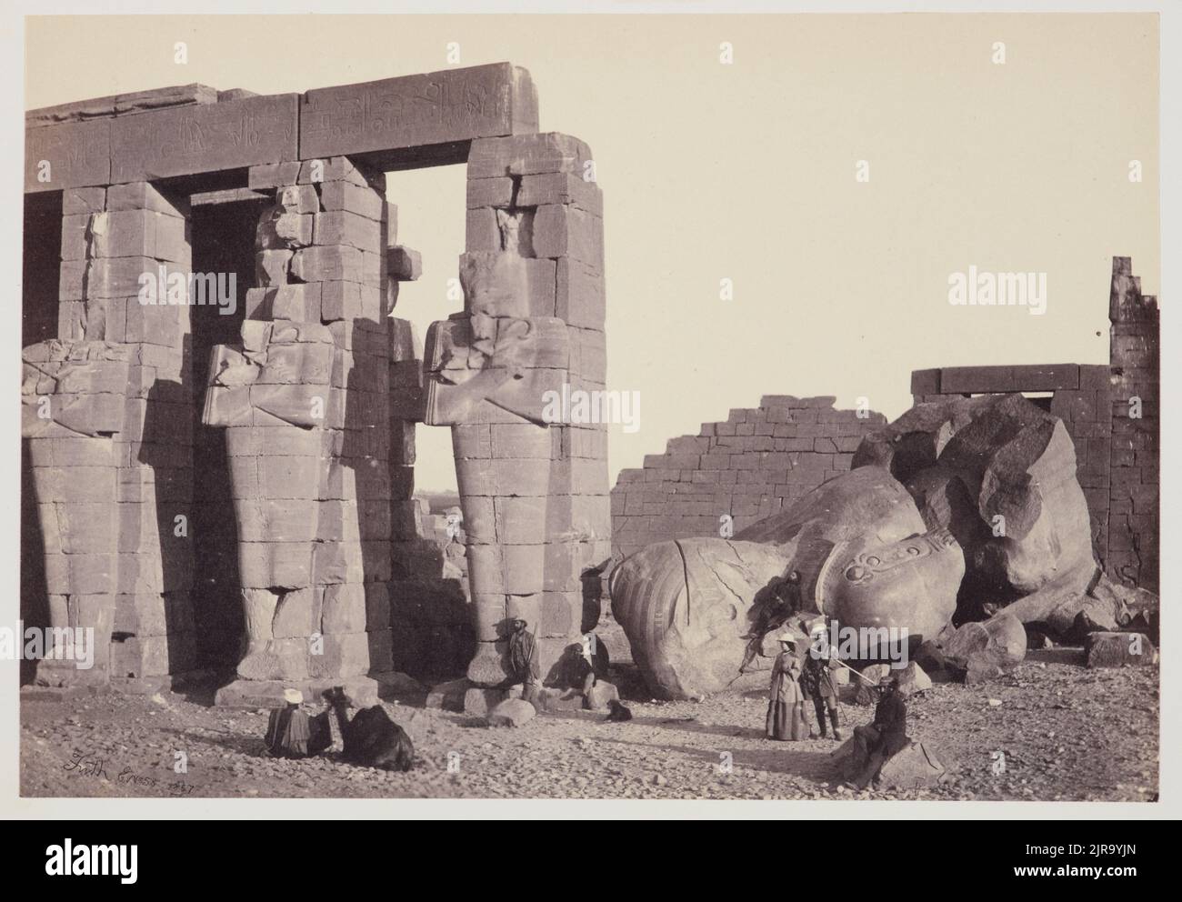 Osridae pillars and great fallen colossus, the Memnonium, Thebes. From ...