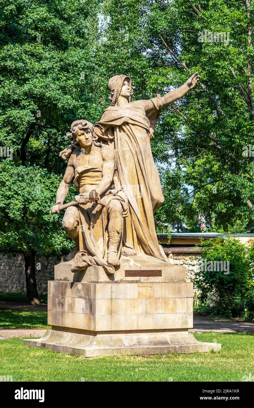 sculpture of slavic mythical figures - statues of Premysl and Libuse on pedestal in Vysehrad, Prague, Czech republic Stock Photo