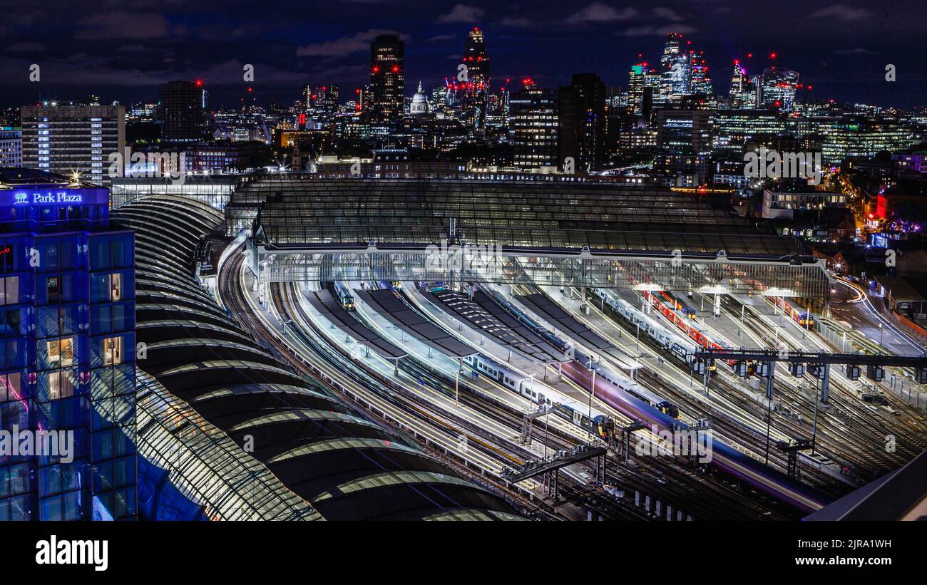 The view of Waterloo Station and beyond at night in London. Stock Photo