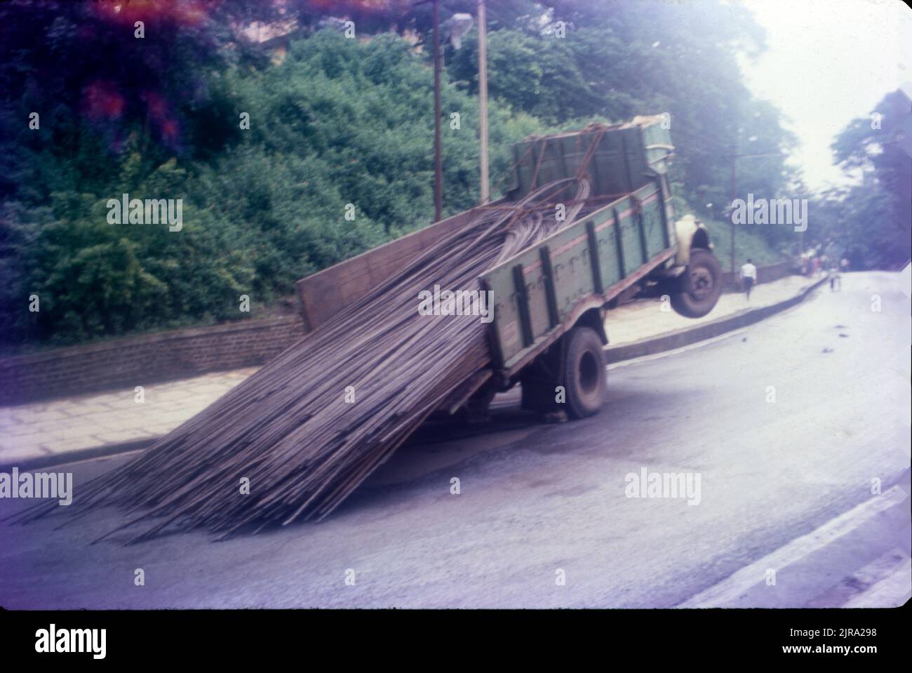 Truck overloaded with plastic containers - Stock Image - C047/7908 -  Science Photo Library