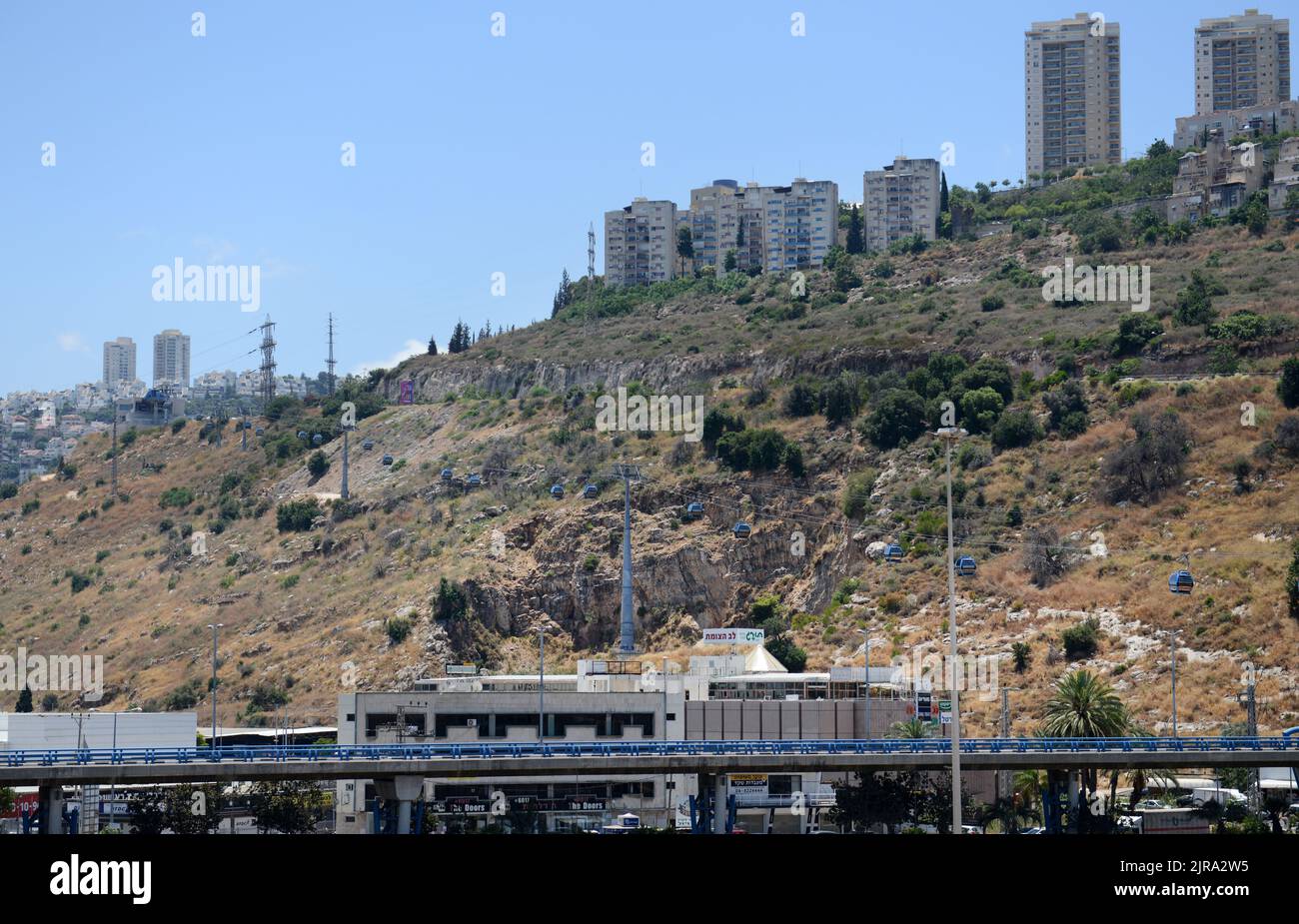 The modern gondola lift system connecting lower Haifa and the University of Haifa on the top of the Carmel mountain. Haifa, Israel. Stock Photo