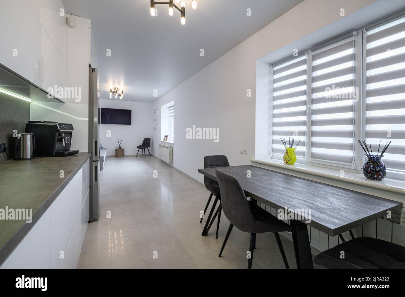 White modern kitchen with granite counter top Stock Photo