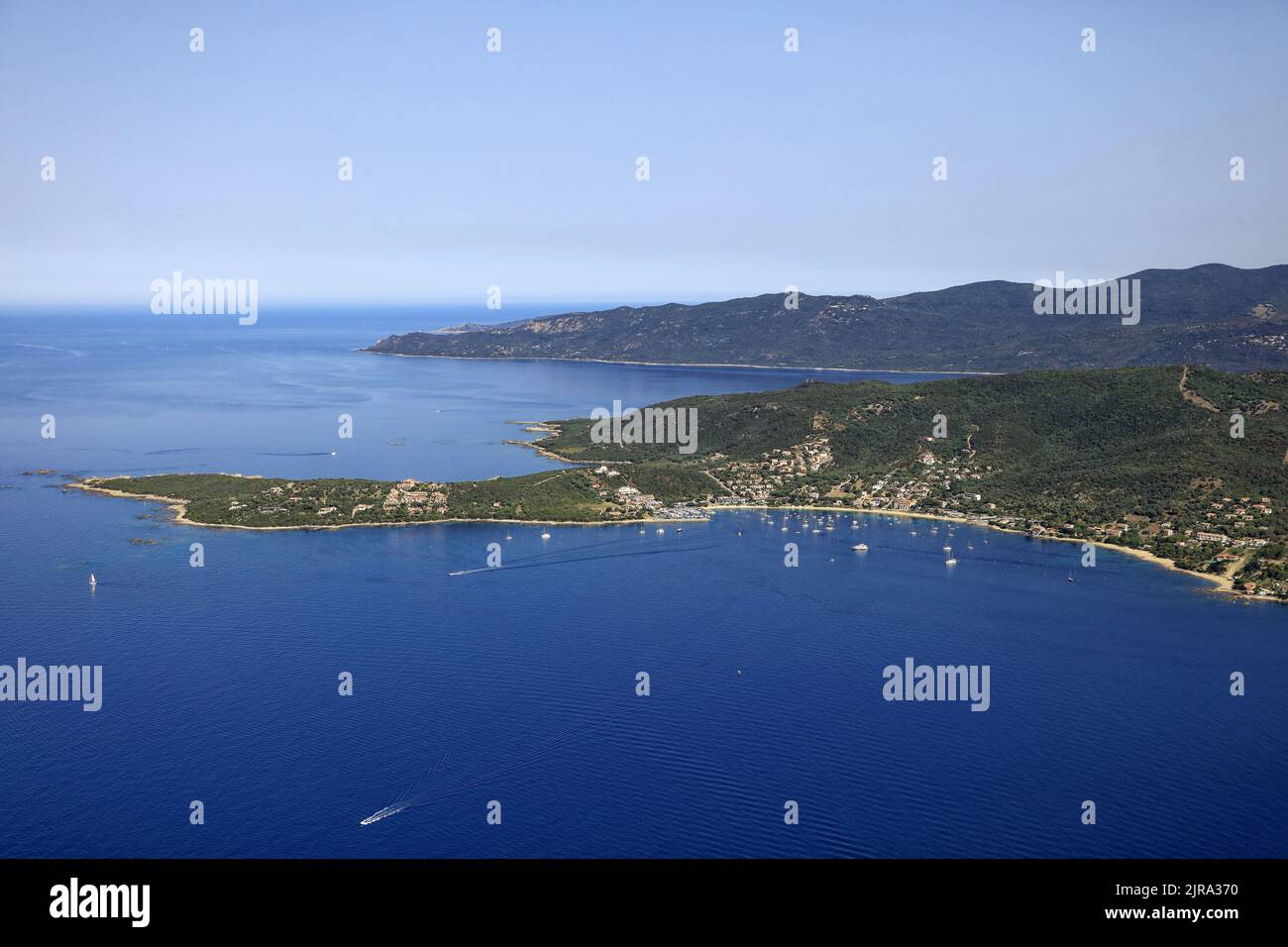 Southern Corsica, Corse-du-sud department, Serra-di-Ferro: aerial view of the hamlet and the Bay of Porto-Pollo Stock Photo
