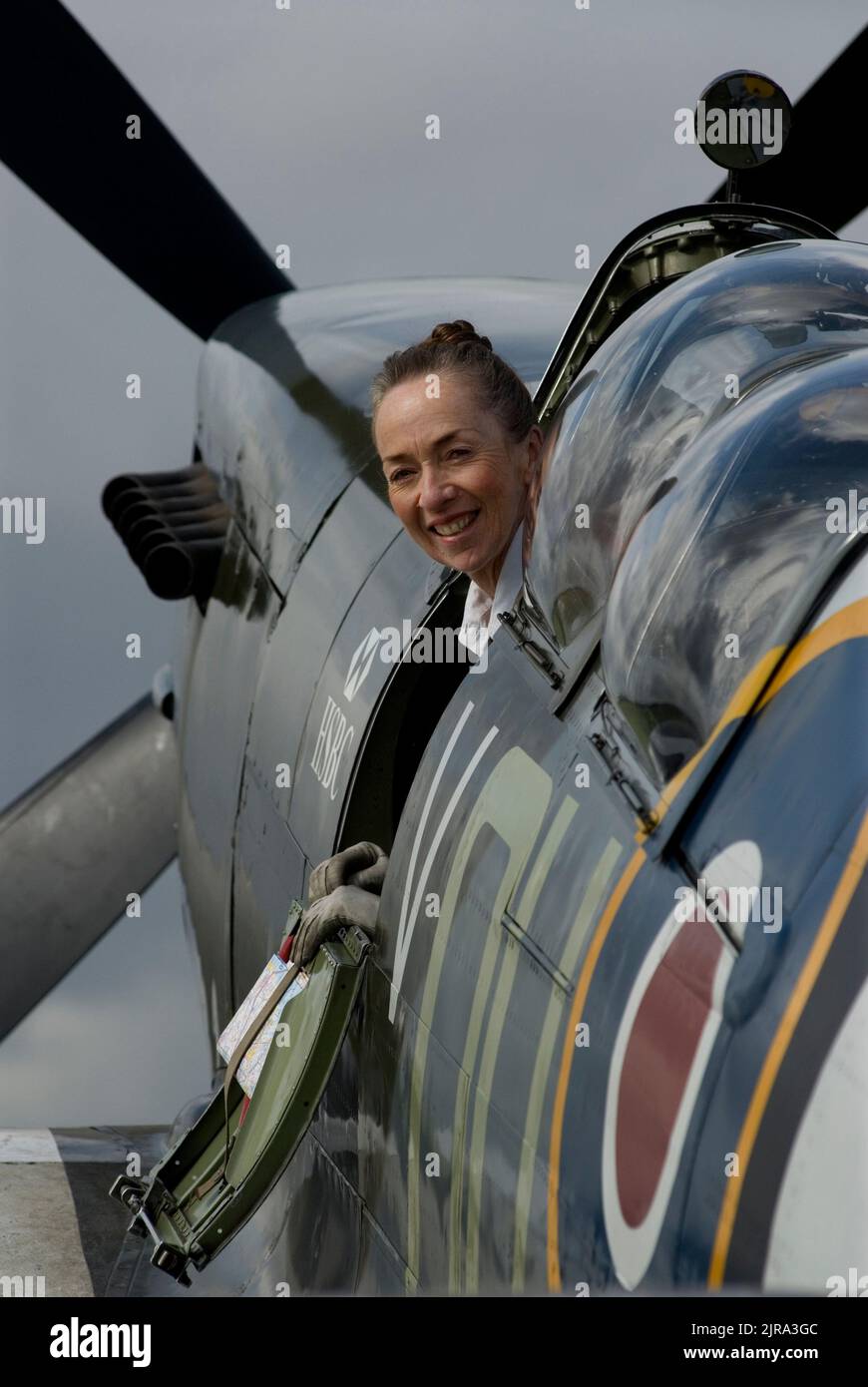Carolyn Grace, Spitfire Pilot. Carolyn Grace with her Spitfire ML 407 at Duxford Airfield, Cambridgeshire, Britain. Photographed for The Independent on Sunday Review Magazine, August 2008. COPYRIGHT PHOTOGRAPH BY BRIAN HARRIS  © 2008 07808-579804 Stock Photo