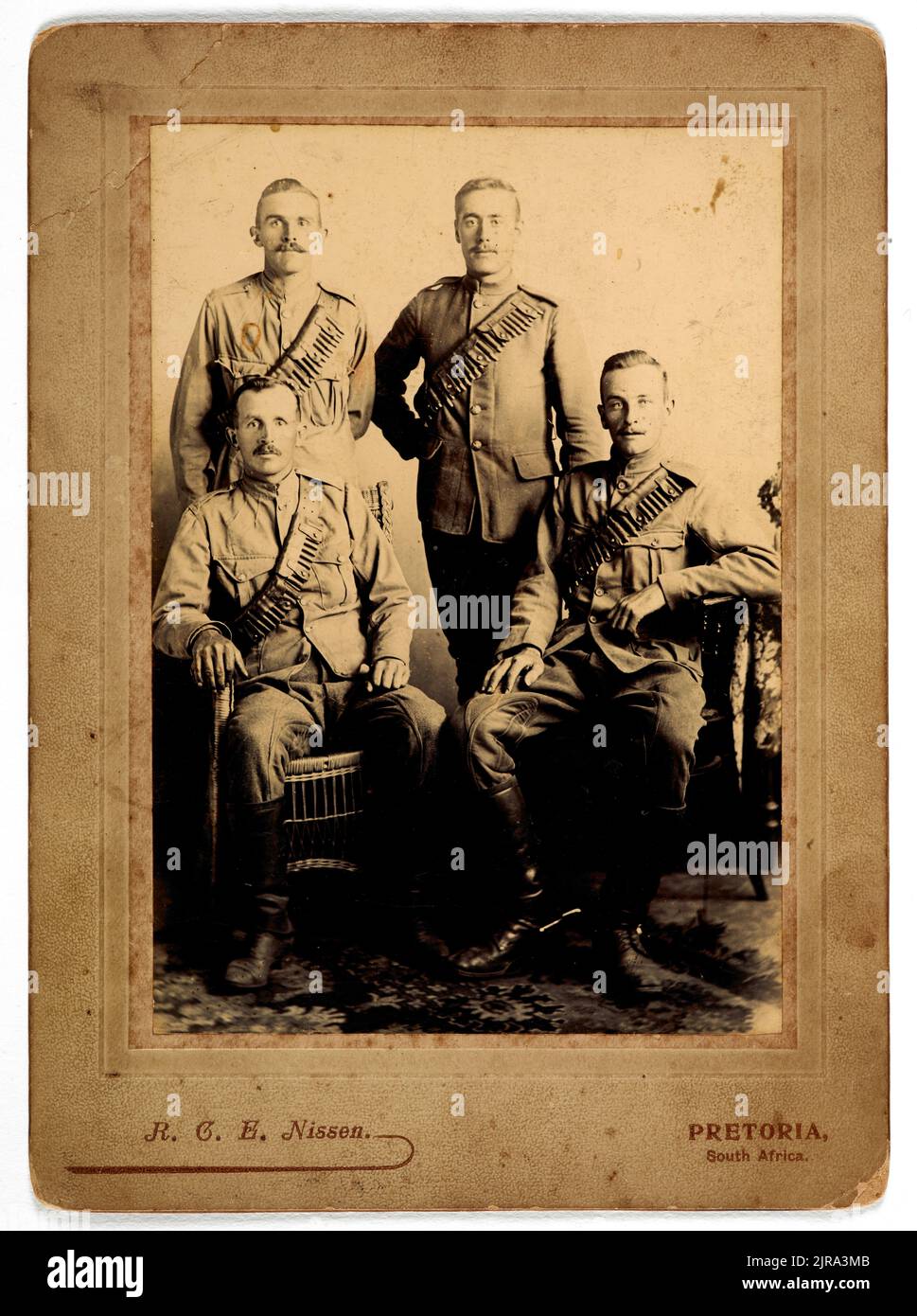 Group portrait of four members of the New Zealand Mounted Rifles on active service in South Africa., 1900-1901, Pretoria, by Robinson Christian Englestoft Nissen. Stock Photo