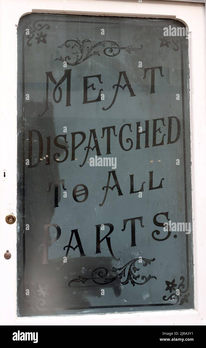 Butchers window, etched with Meat Dispatched To All Parts, Llangollen, Denbighshire, North Wales, UK Stock Photo