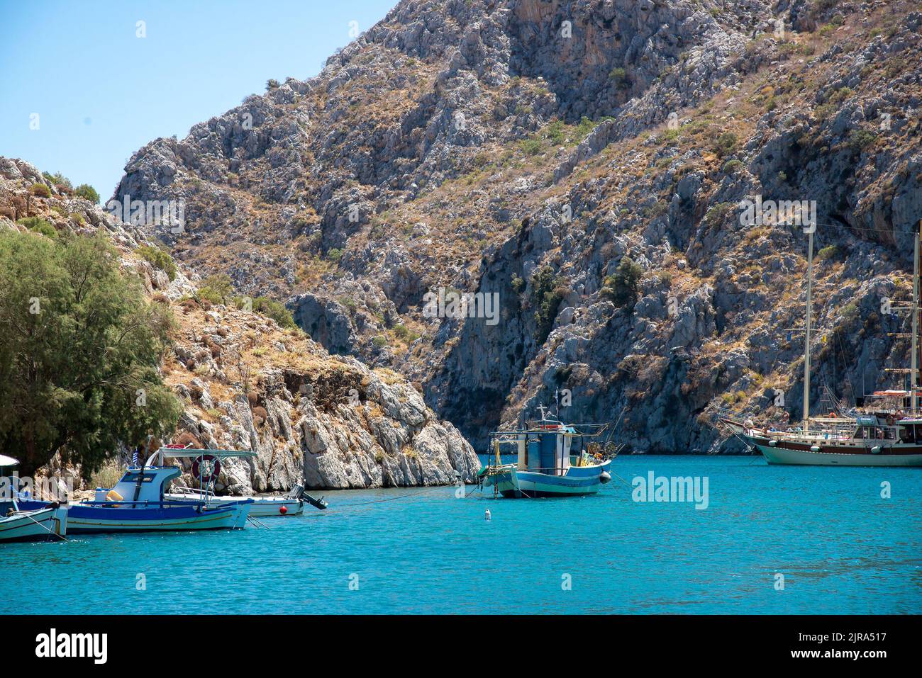 Boats in the harbour at Vathis, Kalymnos, Dodecanese, Greece, South Aegean. Stock Photo
