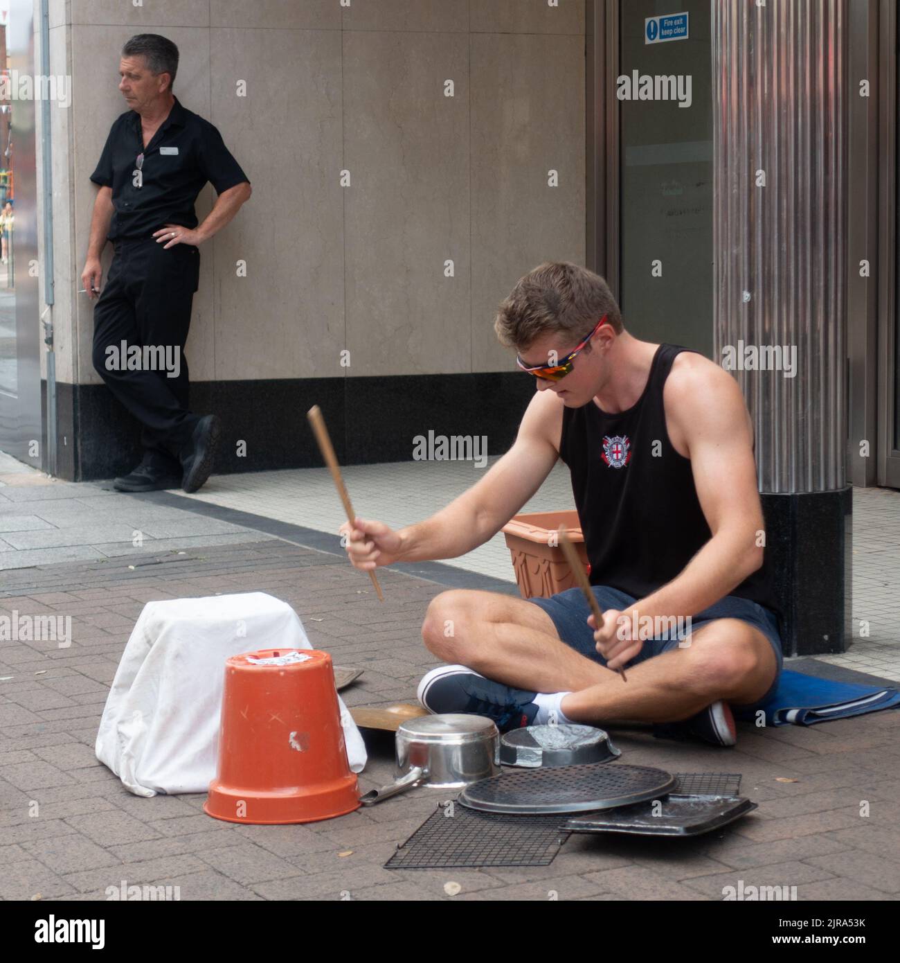 Drumming Busker Stock Photo