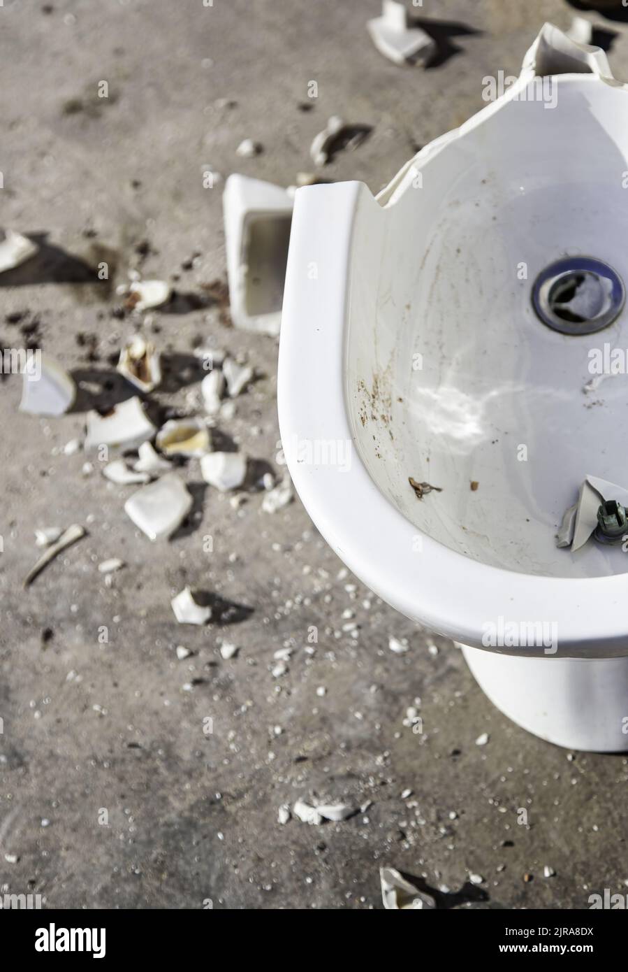 Beam detail toilet bowl thrown in the trash, recycling Stock Photo Alamy