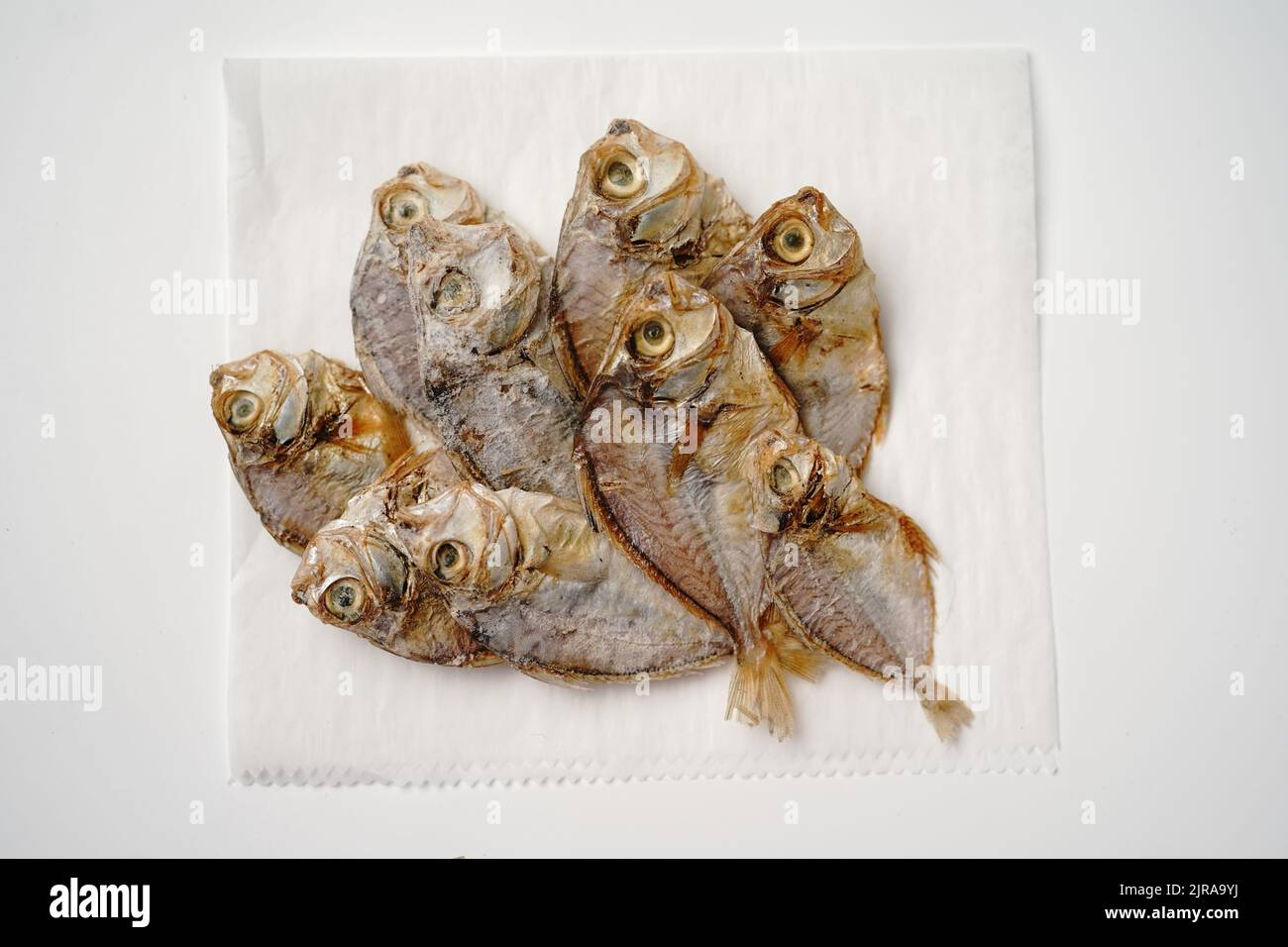 Salted dry fish cod isolated on white background Stock Photo Alamy