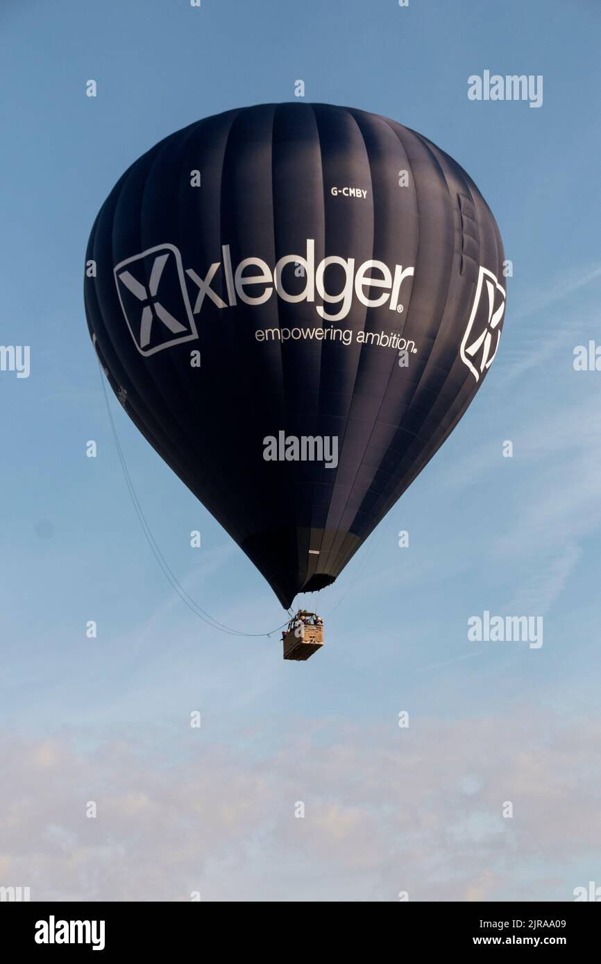A hot air ballon high up in the sky Stock Photo