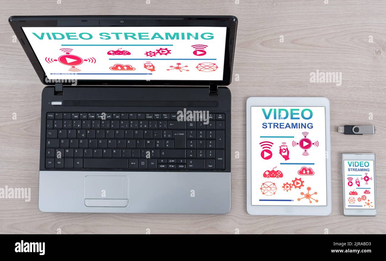 Video streaming concept shown on different information technology devices Stock Photo