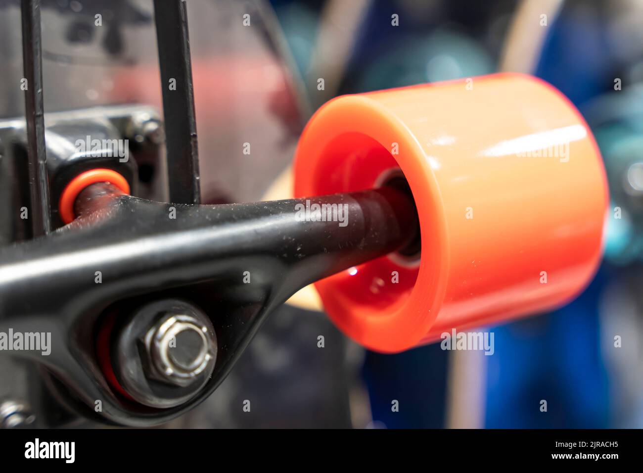 a skateboard wheel. Skateboard, wheels, axle in a sports store Stock