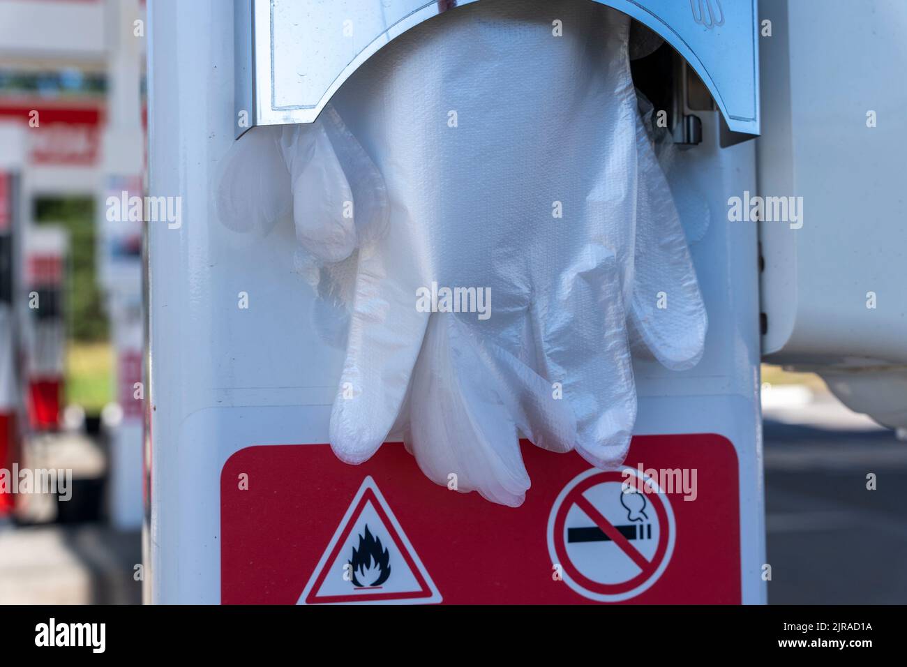 plastic fuel disposable gloves at a gas station. hygiene measures Stock Photo Alamy