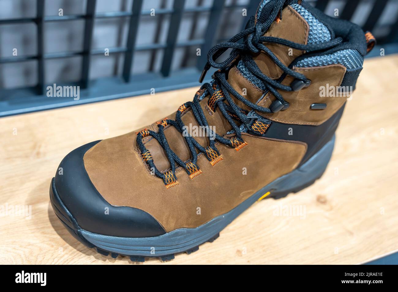 New Modern leather Mountain Boots with lacing close-up Stock Photo - Alamy