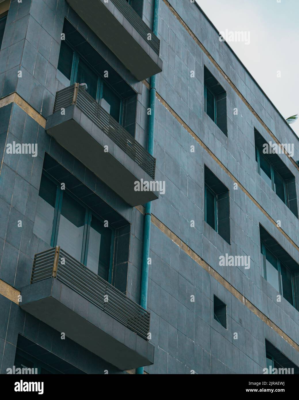 A vertical shot of a modern building facade Stock Photo - Alamy