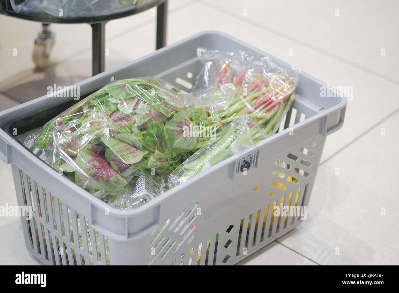 Shopping cart full of food in the supermarket  Stock Photo