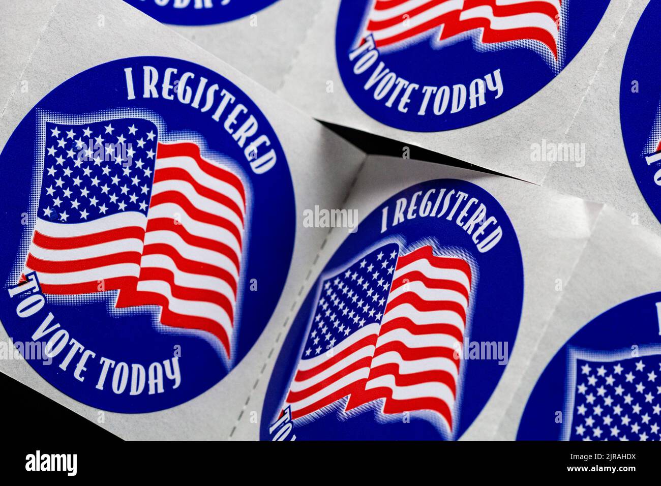 Stickers say "I registered to vote today" for the 2022 midterm