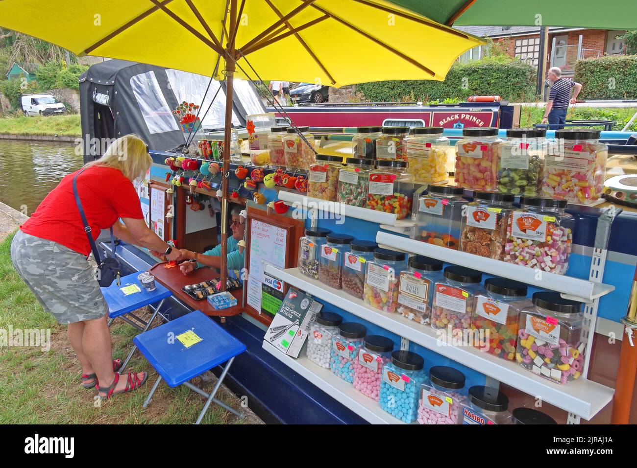 Buying sweets from a barge, Vale of Llangollen, Trevor, Llangollen, Wales, UK,  LL20 7TP Stock Photo