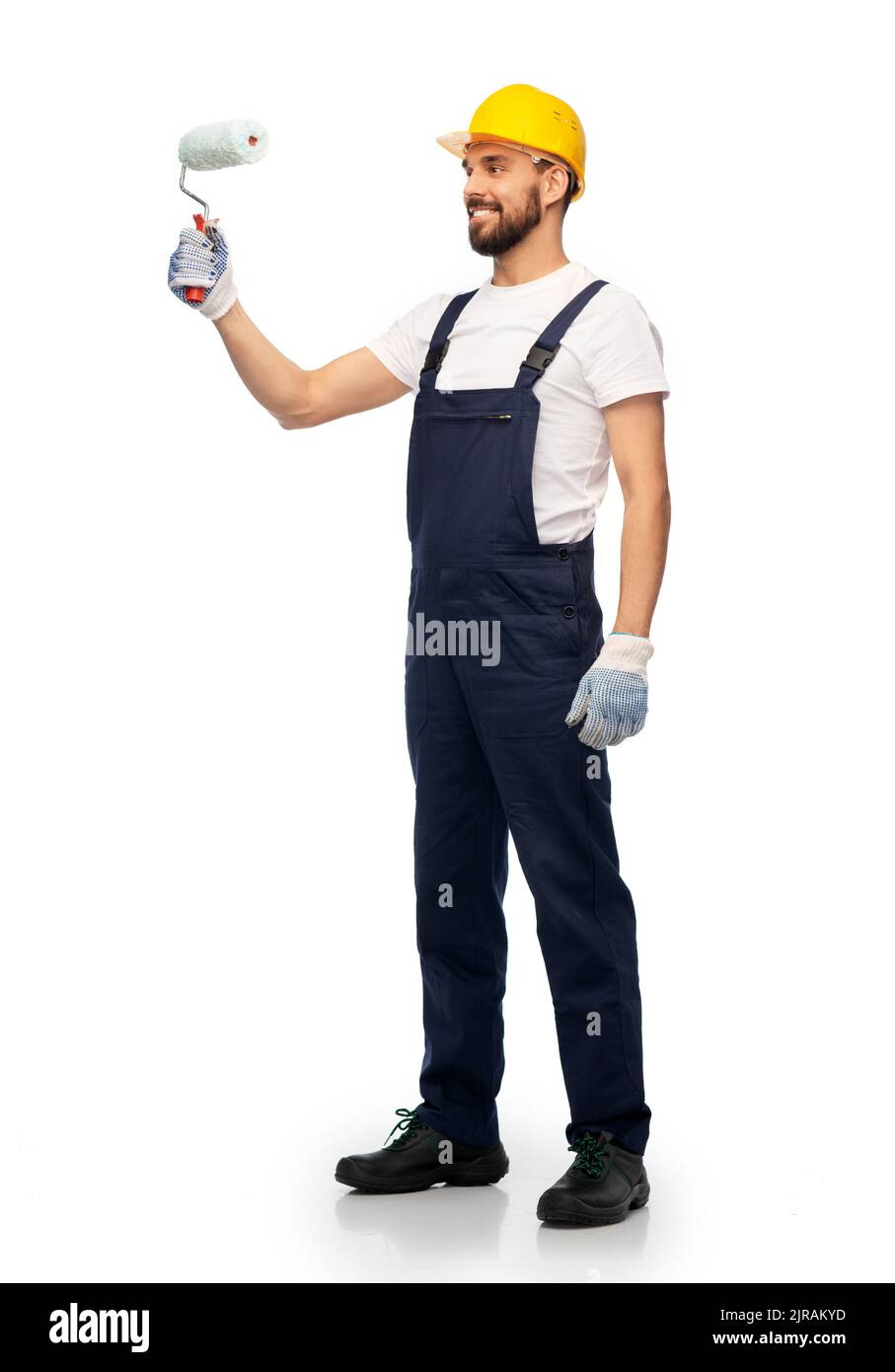 male worker or builder with paint roller Stock Photo